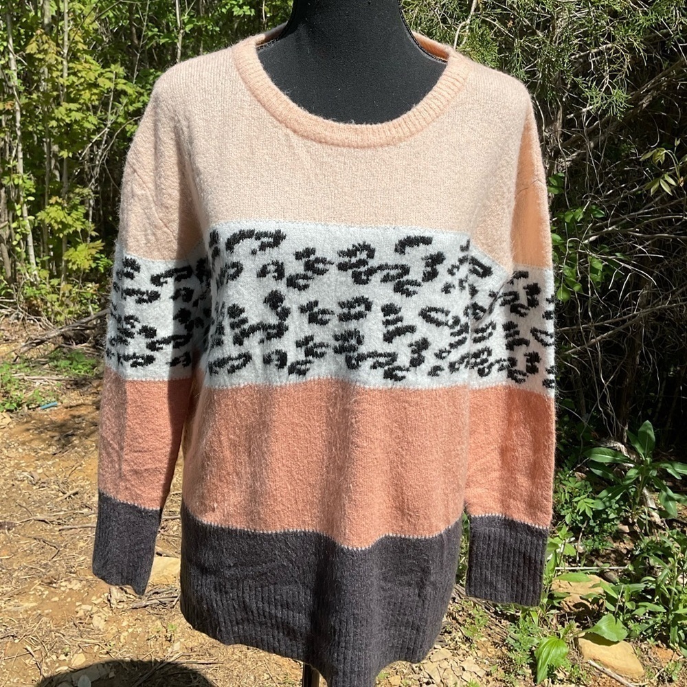 Pink Lily size Sm. Sweater. animal print.